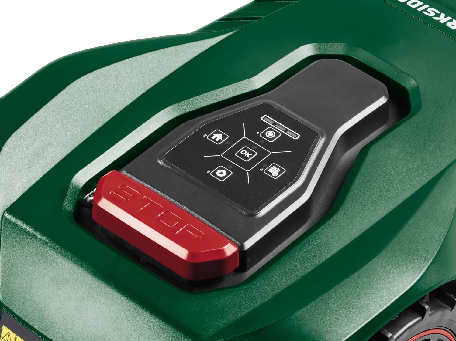 Panneau de commande d'un robot tondeuse vert avec bouton d'arrêt rouge.