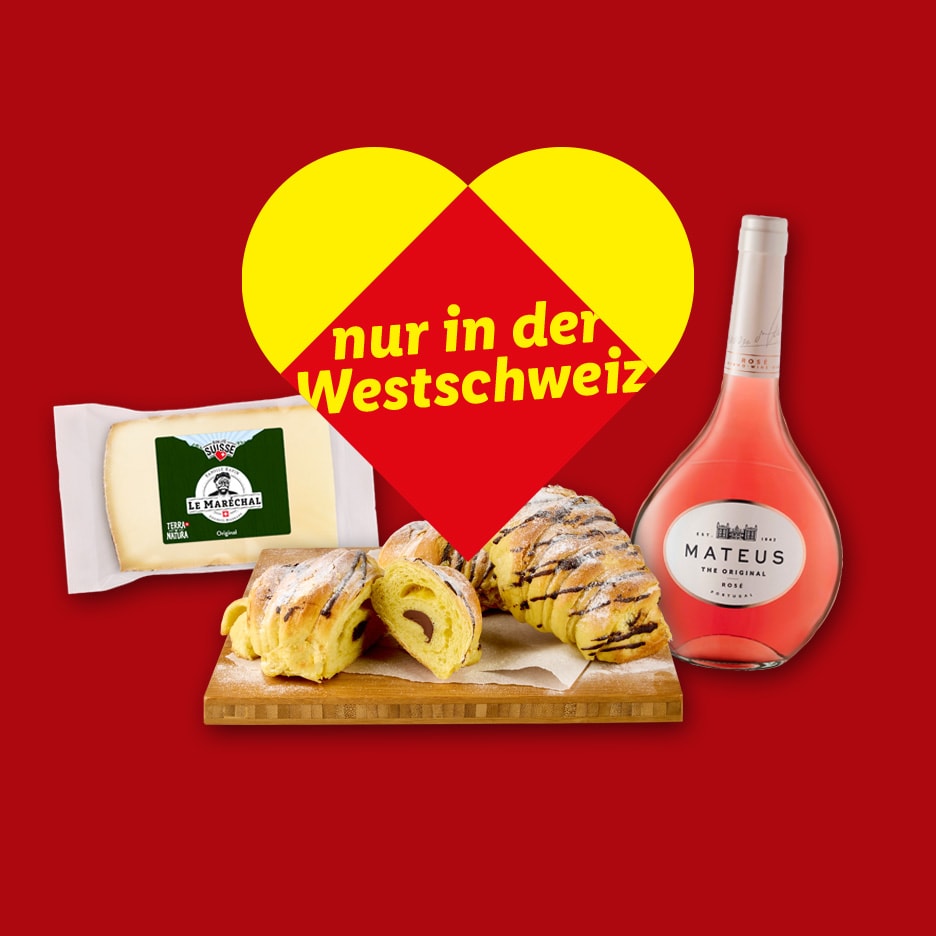 Käse, Schokoladen-Croissants und Roséwein mit der Aufschrift 'nur in der Westschweiz'.