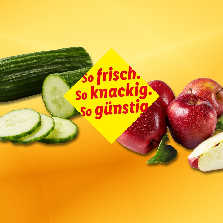 Frische Gurken und rote Äpfel, mit Text: „so frisch, so knackig, so günstig“.