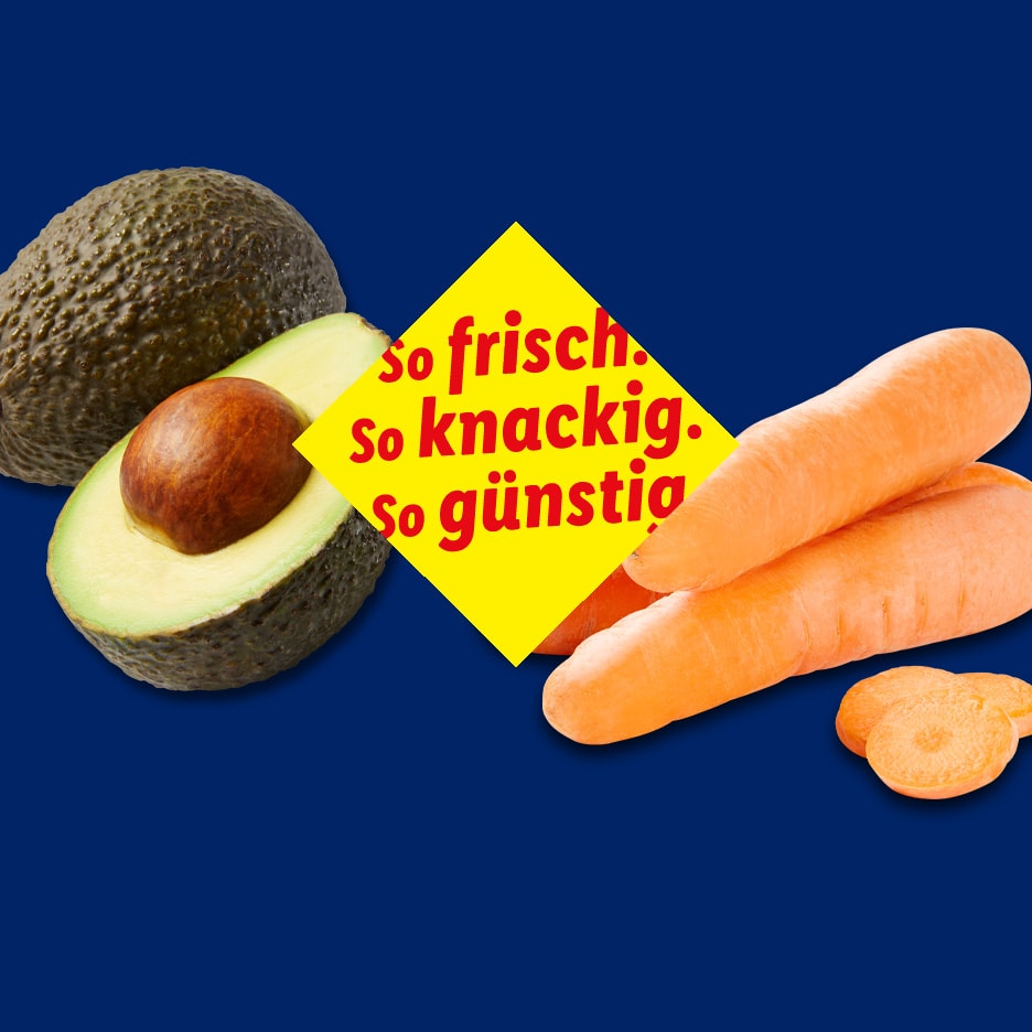 Avocado und Karotten mit einem gelben Schild: „So frisch. So knackig. So günstig.“