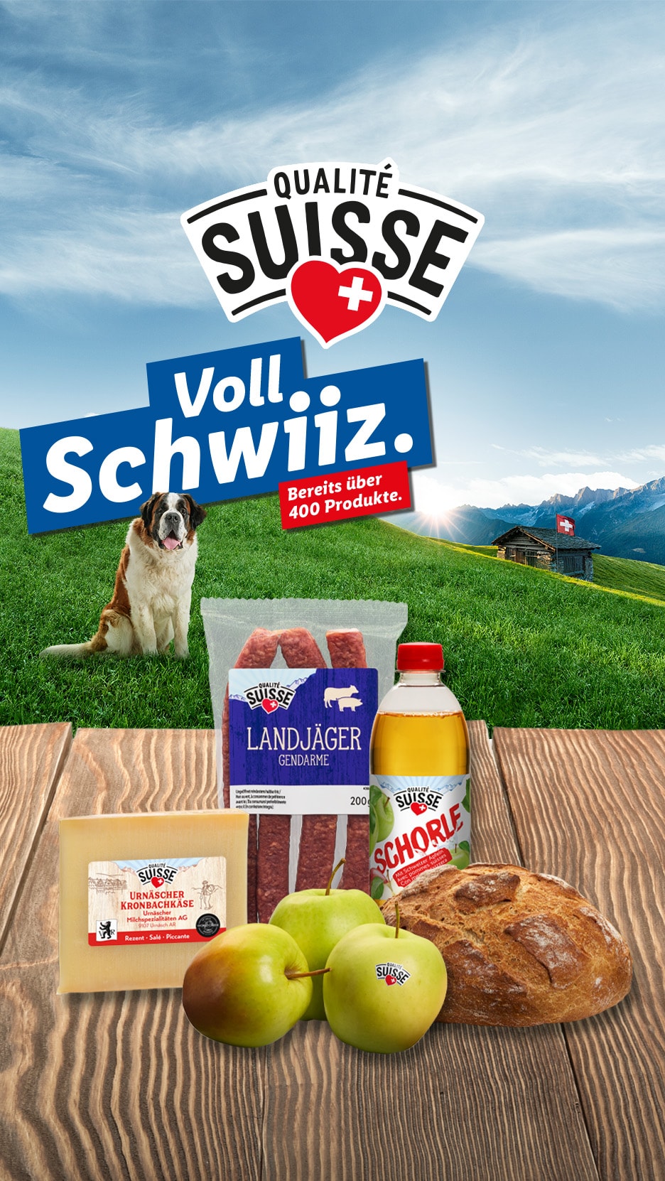 Schweizer Produkte wie Käse, Wurst, Brot, Äpfel und Getränke, mit einem Bernhardiner und Alpenlandschaft.