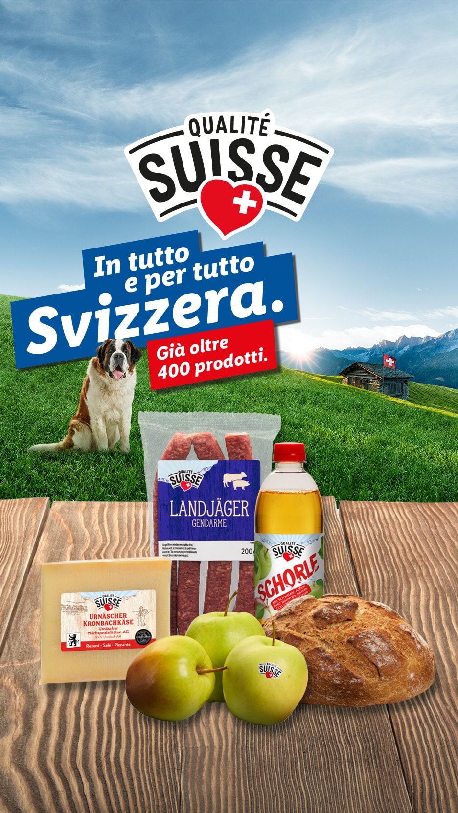Schweizer Qualitätsprodukte wie Käse, Wurst, Getränke und Obst, mit einem Bernhardiner und Alpenlandschaft.