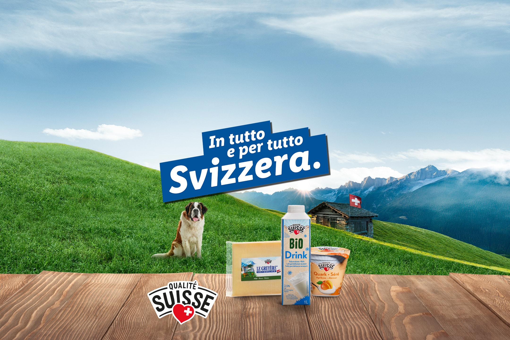 Prodotti lattiero-caseari svizzeri (Bio Drink, Quark, formaggio Gruyère) con San Bernardo e baita alpina.