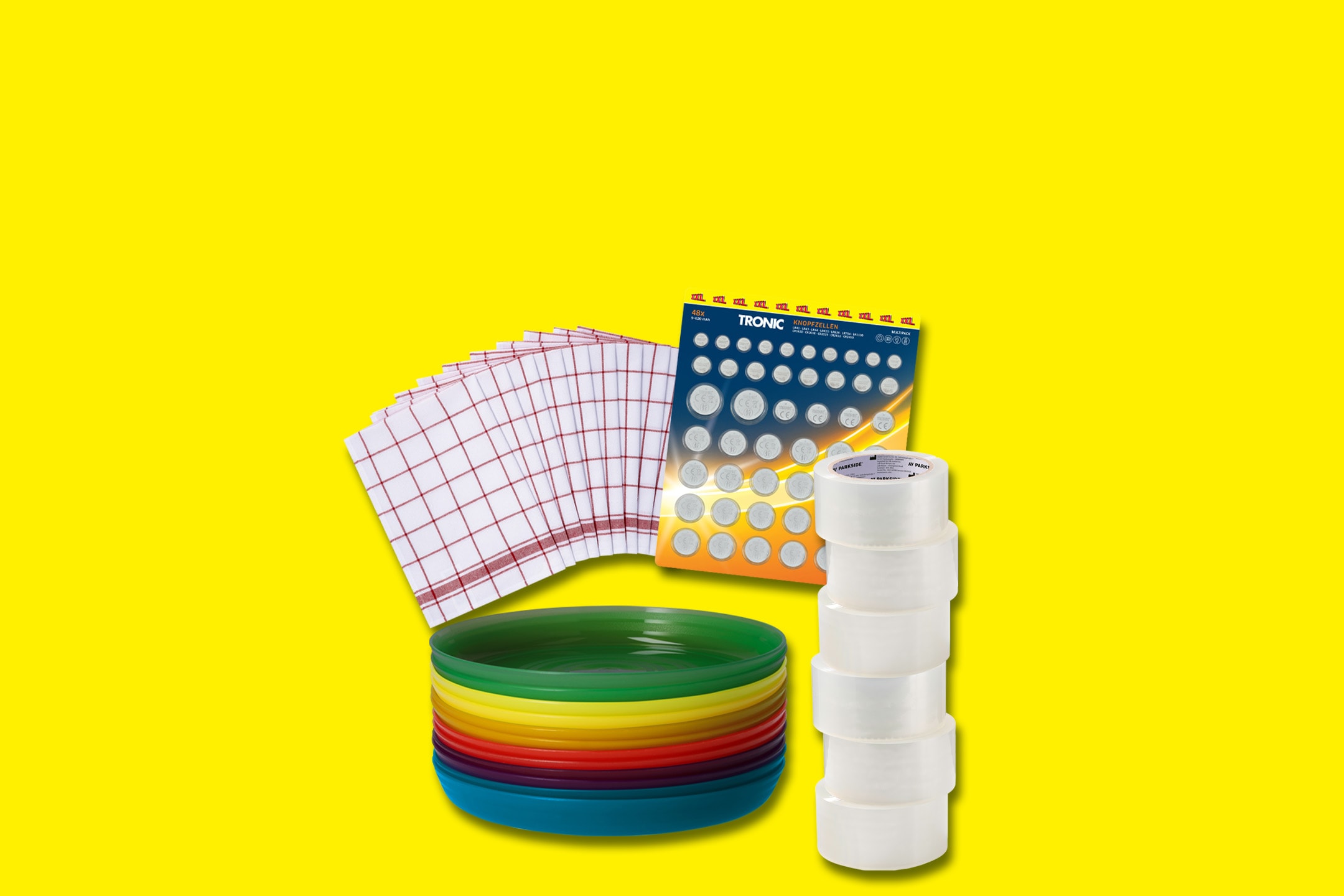 Bunte Teller, Geschirrtücher, Knopfzellen von Tronic und Klebeband.