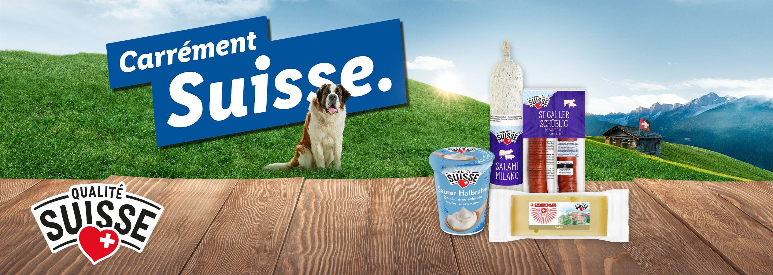 Produits suisses de qualité avec un Saint-Bernard et un paysage alpin.