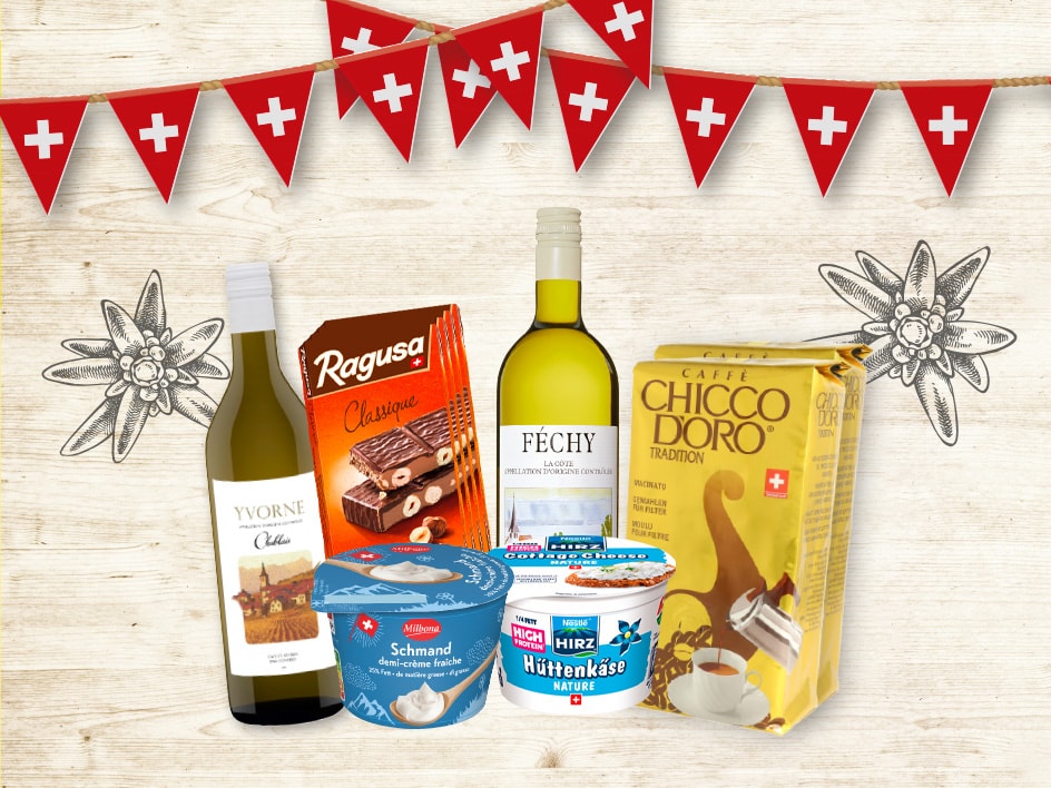 Confezione regalo svizzera con vino, cioccolato Ragusa, caffè Chicco d'Oro e yogurt.