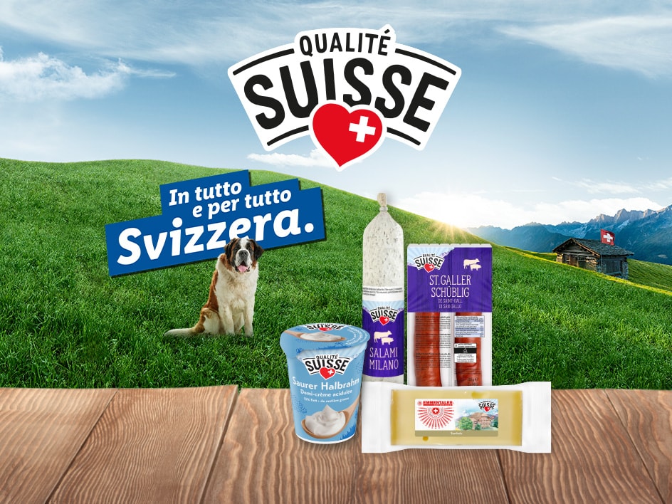 Prodotti alimentari svizzeri con un cane San Bernardo e un paesaggio alpino.