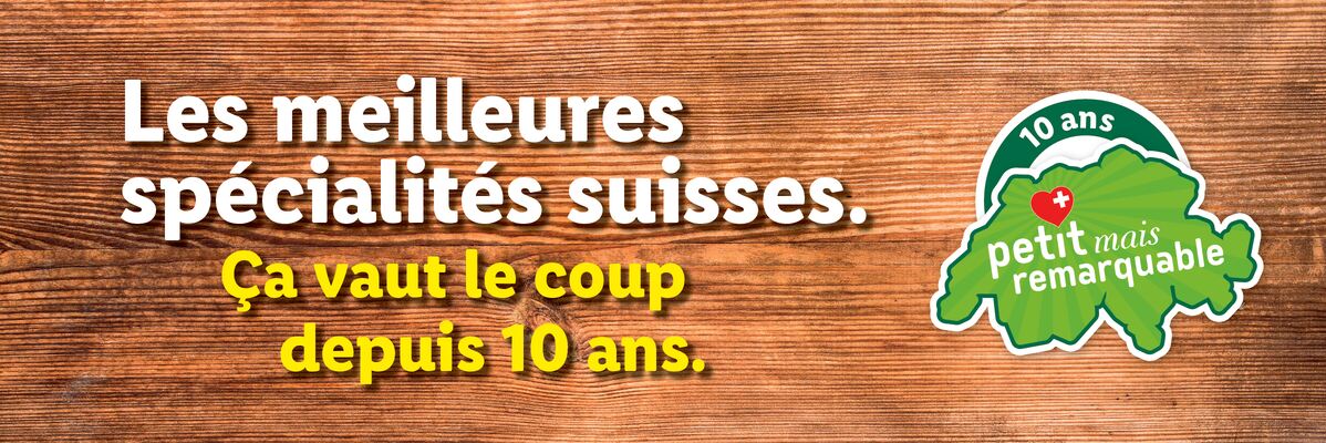 Spécialités suisses sur fond de bois, avec logo '10 ans petit mais remarquable'.