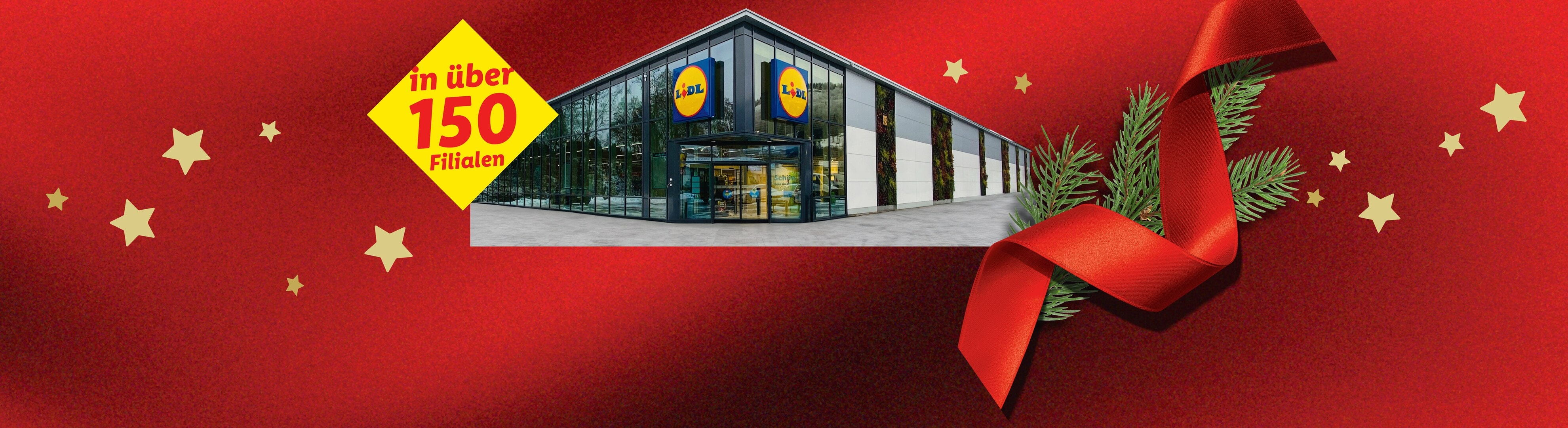 Lidl Filiale mit gelbem Schild 'in über 150 Filialen' auf festlichem rotem Hintergrund.
