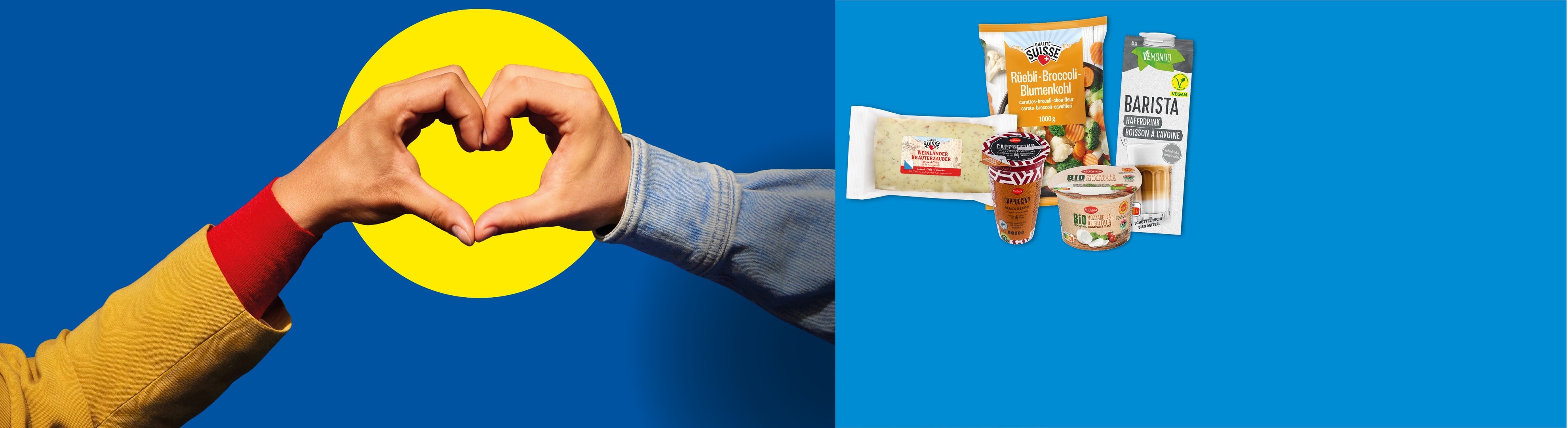 Hände formen ein Herz auf gelb-blauem Hintergrund, mit Pflanzengetränk, Mischgemüse und Käse.