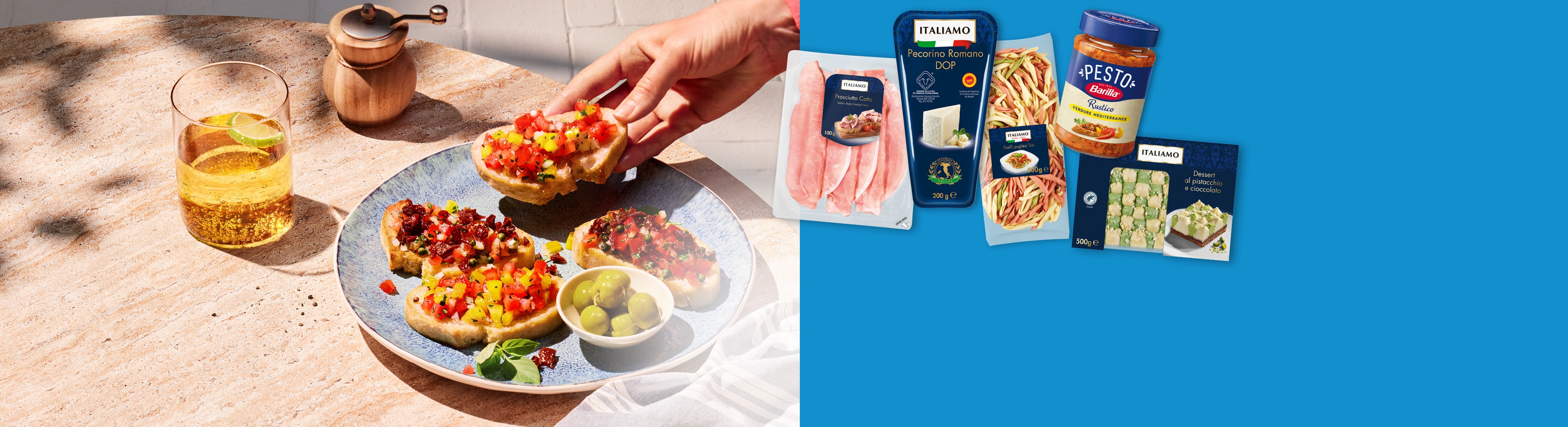 Una selezione di specialità italiane come bruschette, salumi, formaggi, pasta, pesto e dessert.