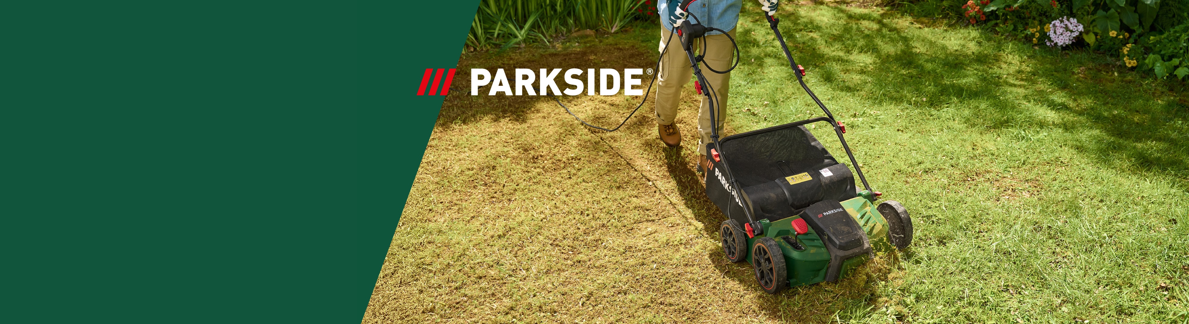 Un uomo usa uno scarificatore elettrico su un prato, con il logo del marchio in alto a sinistra.