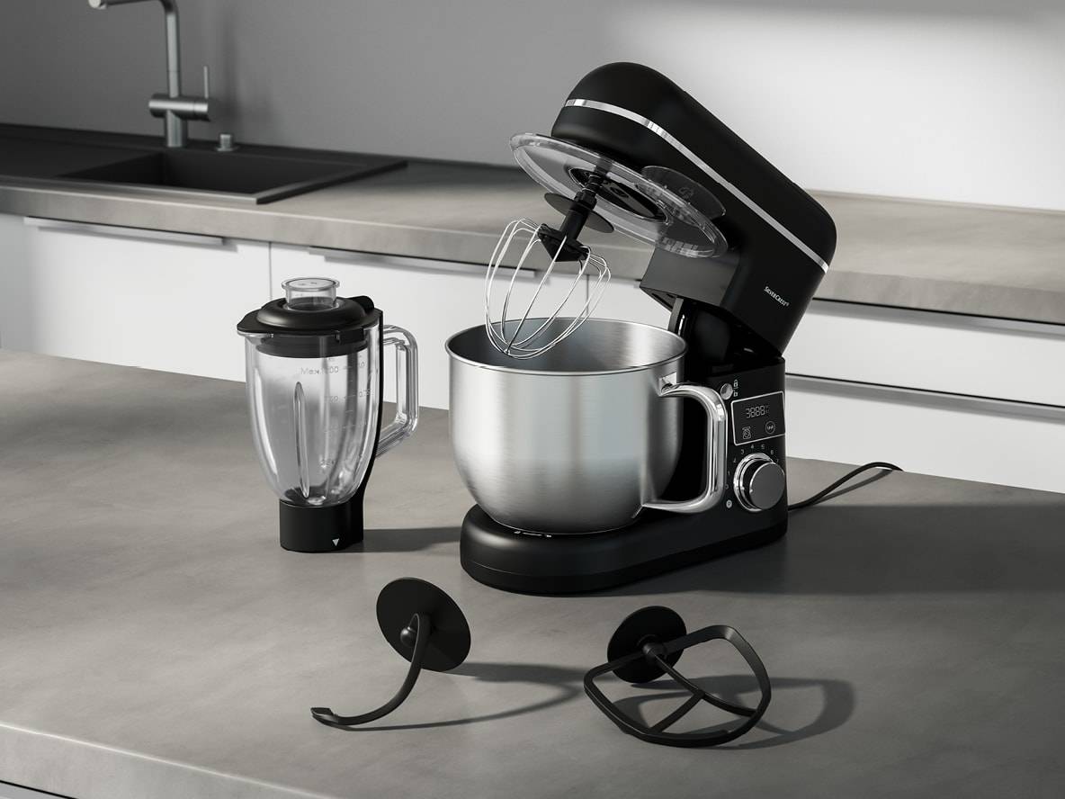 Eine schwarze SilverCrest Küchenmaschine mit Edelstahlschüssel und Mixer auf einer Küchenarbeitsplatte.