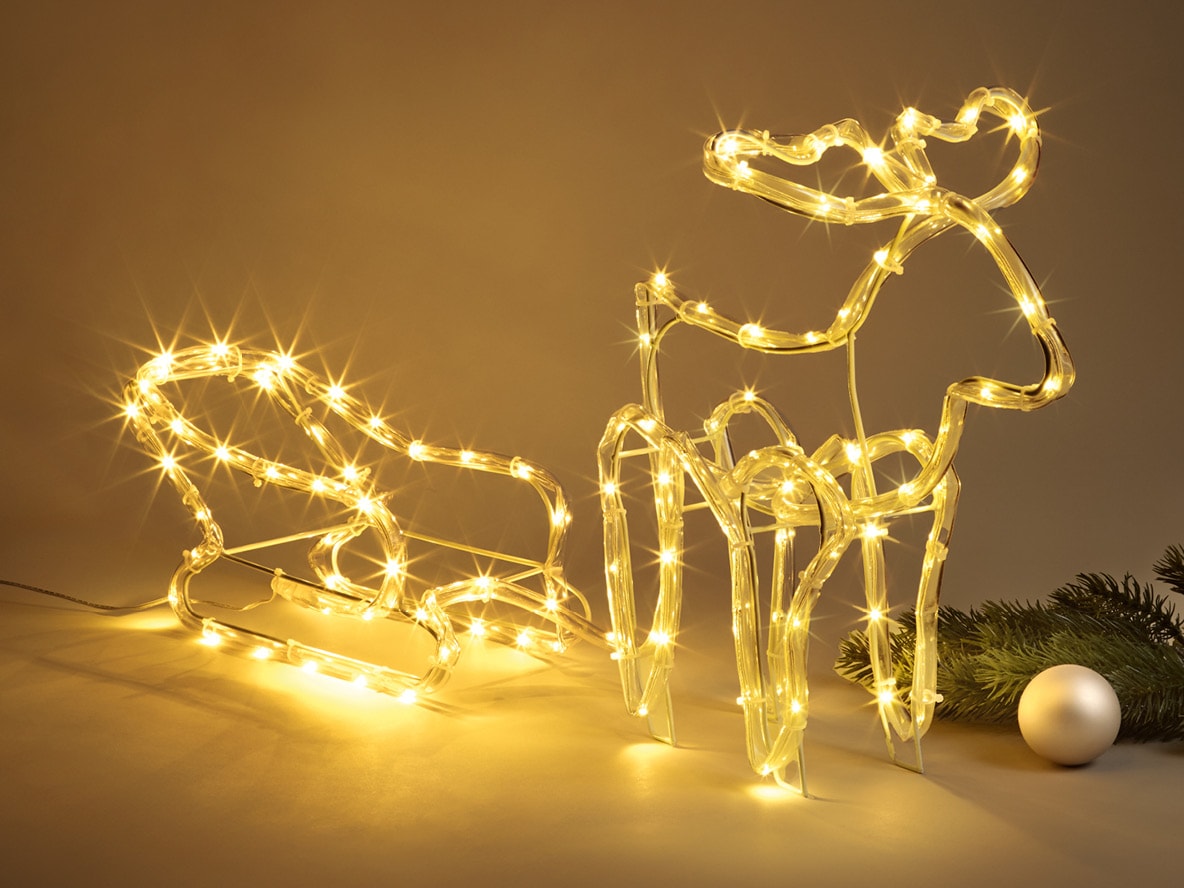 Leuchtende LED-Weihnachtsdekoration mit Rentier und Schlitten.