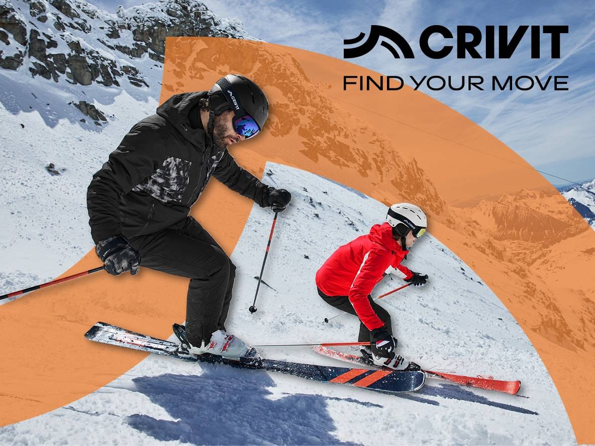 Zwei Skifahrer in Crivit-Ausrüstung auf einem verschneiten Berg, mit dem Text „FIND YOUR MOVE“