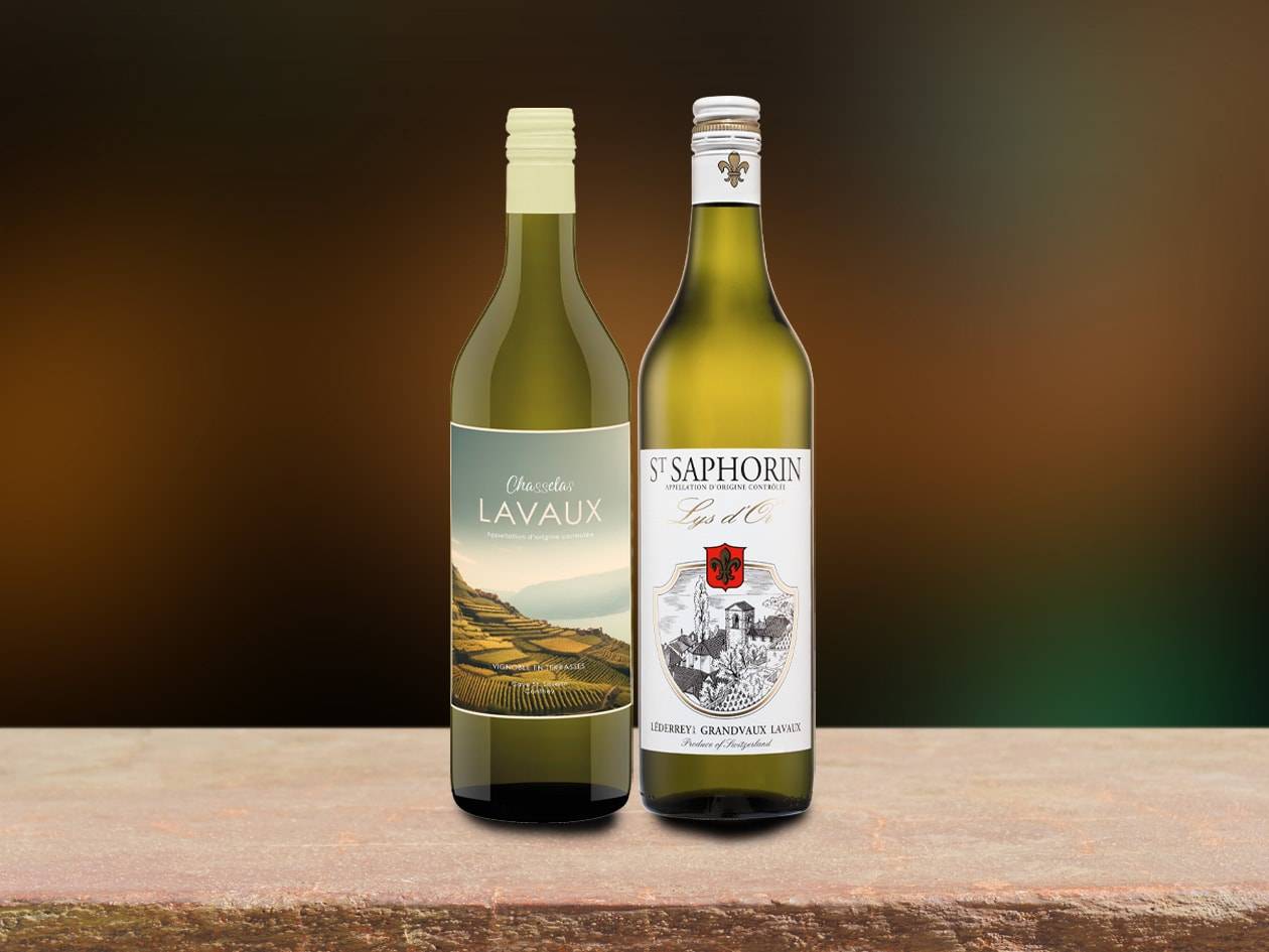 Zwei Flaschen Weißwein mit Etiketten, die Landschaften und Texte wie „LAVAUX“ und „ST SAPHORIN“ zeigen.
